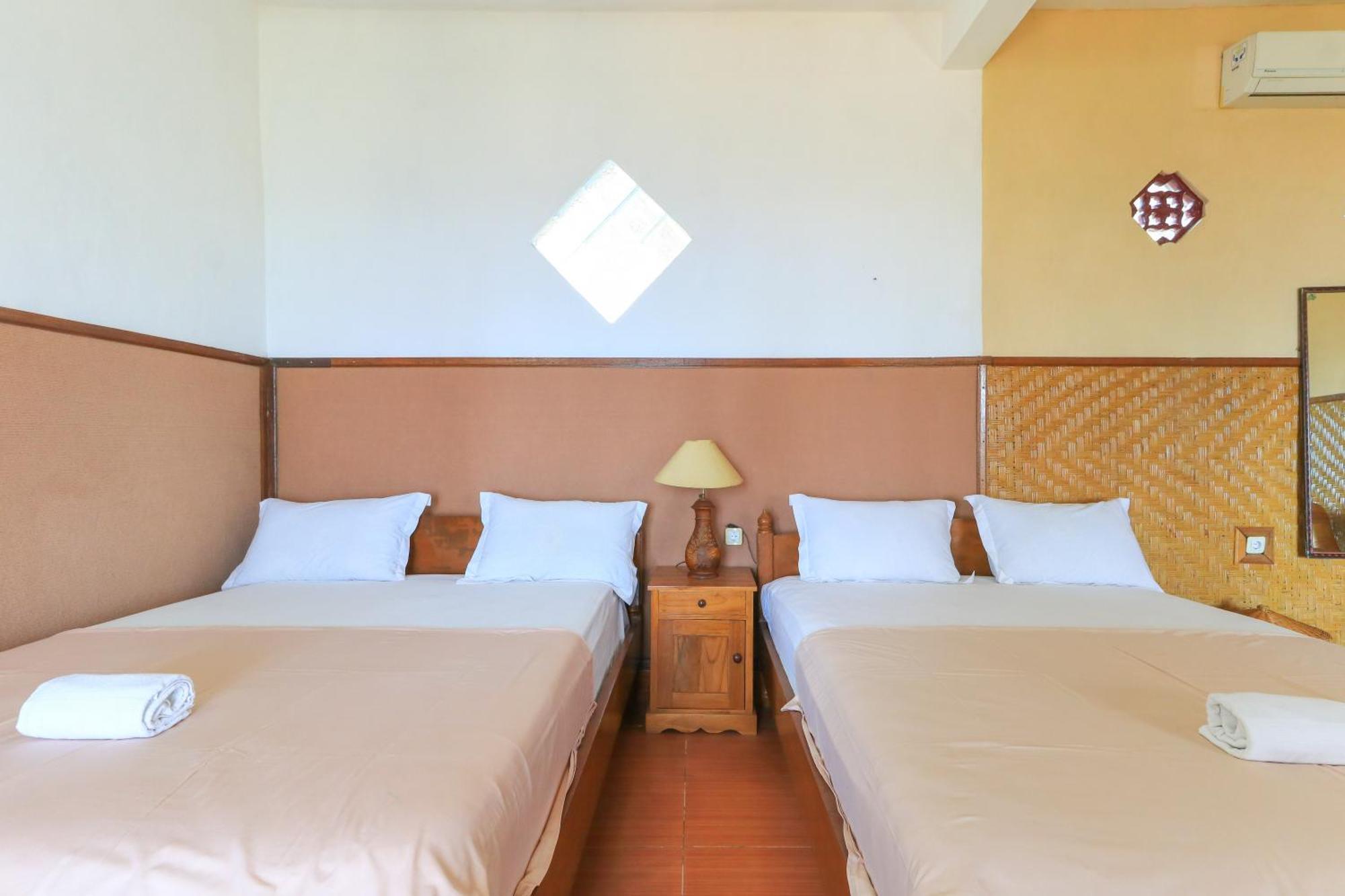 Hotel Tara Bar & Resto Air Sanih Кубутамбахан Номер фото